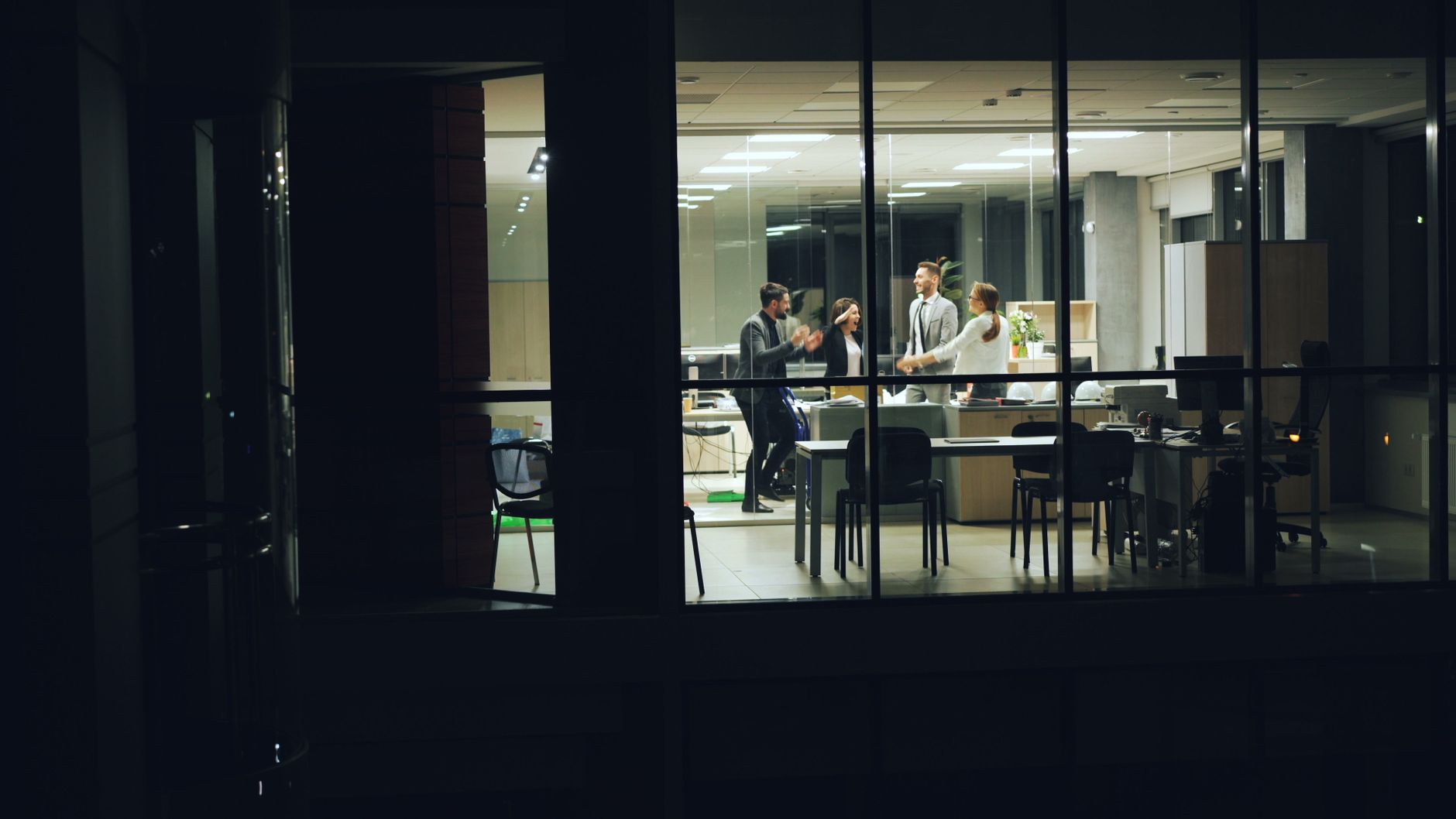 After-hours desk lights in a shared building