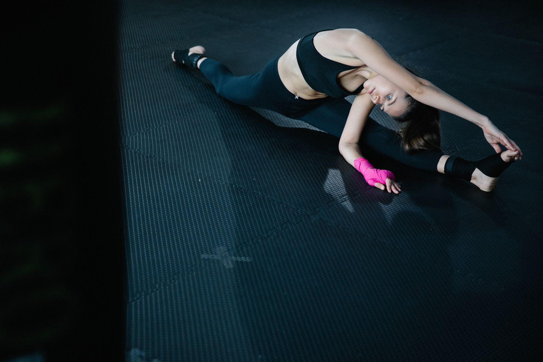 Floor mobility work on a rubber mat